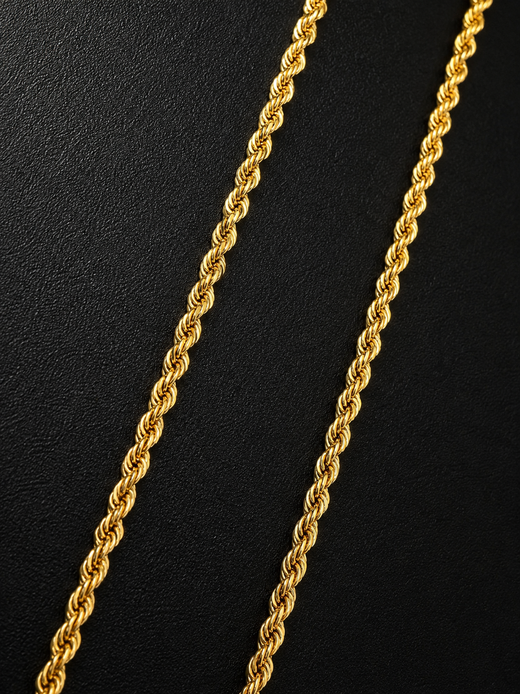 14K Italian gold rope chain with lobster clasp detail and Made in Italy badge