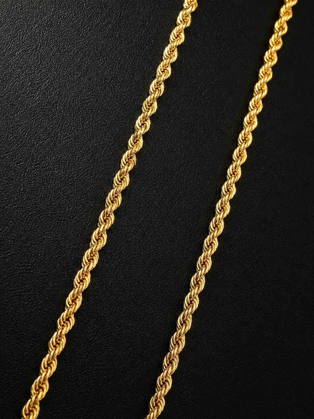 14K Italian gold rope chain with lobster clasp detail and Made in Italy badge