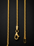 14K solid yellow gold Italian diamond-cut rope chain necklace with lobster clasp on black background